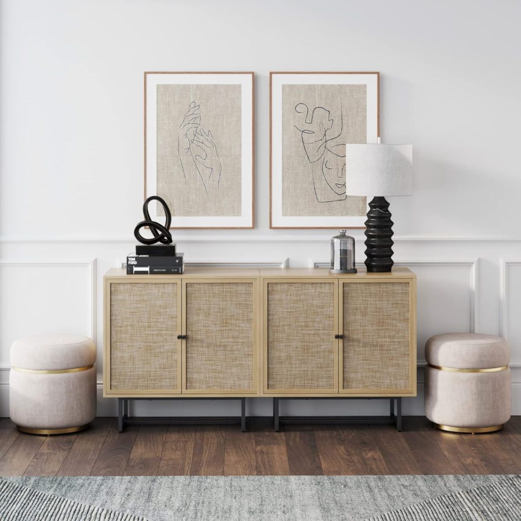 A wooden sideboard with a black lamp and decorative items is flanked by two round stools, creating a stylish setting worthy of an Amazon Prime home decor showcase. Two line art prints hang elegantly on the wall above.