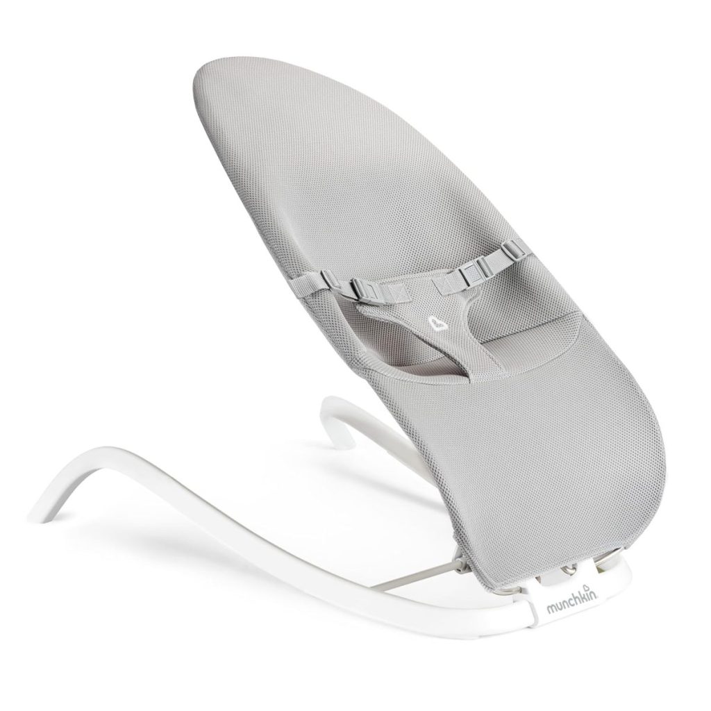 A grey baby bouncer with a mesh seat and safety harness sits on a curved white frame, available for fast shipping with Amazon Prime.