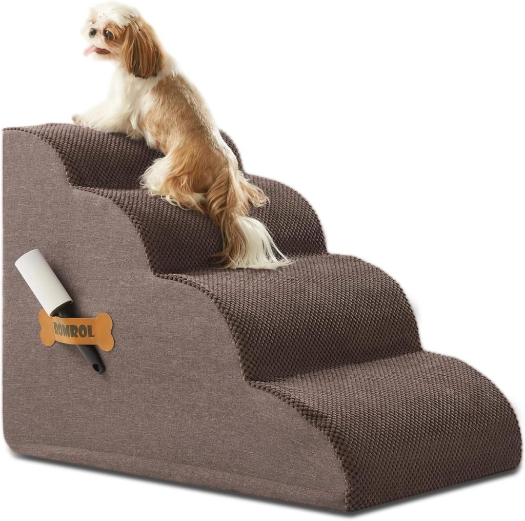 A small dog sits on a three-step pet staircase with a brown fabric cover and a lint roller attached to the side, available for quick delivery through Amazon Prime.