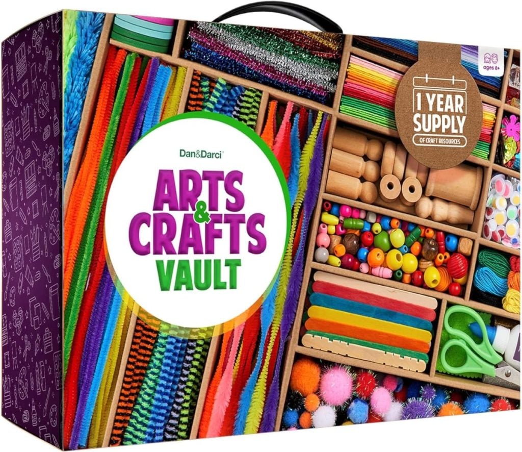 The "Arts & Crafts Vault" boxed set, available with Amazon Prime, is brimming with colorful supplies like pipe cleaners, beads, sticks, and pom-poms. A tag promises a "1 Year Supply of Craft Materials," perfect for endless creative projects delivered right to your door.