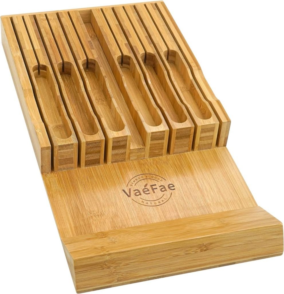 A bamboo knife block with multiple slots for storing knives, perfect for preparing dishes like Baked Brie with Jam. The brand name "VaeFae" is elegantly engraved on the bottom section.