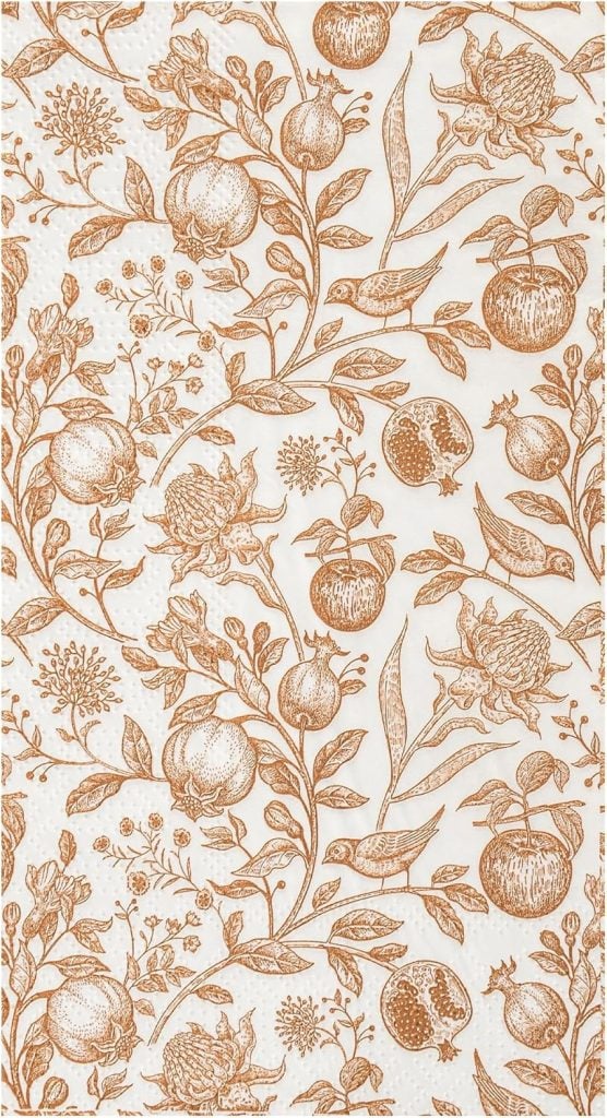 Intricate floral and fruit pattern in sepia tones on a cream background, featuring pomegranates, flowers, and foliage.