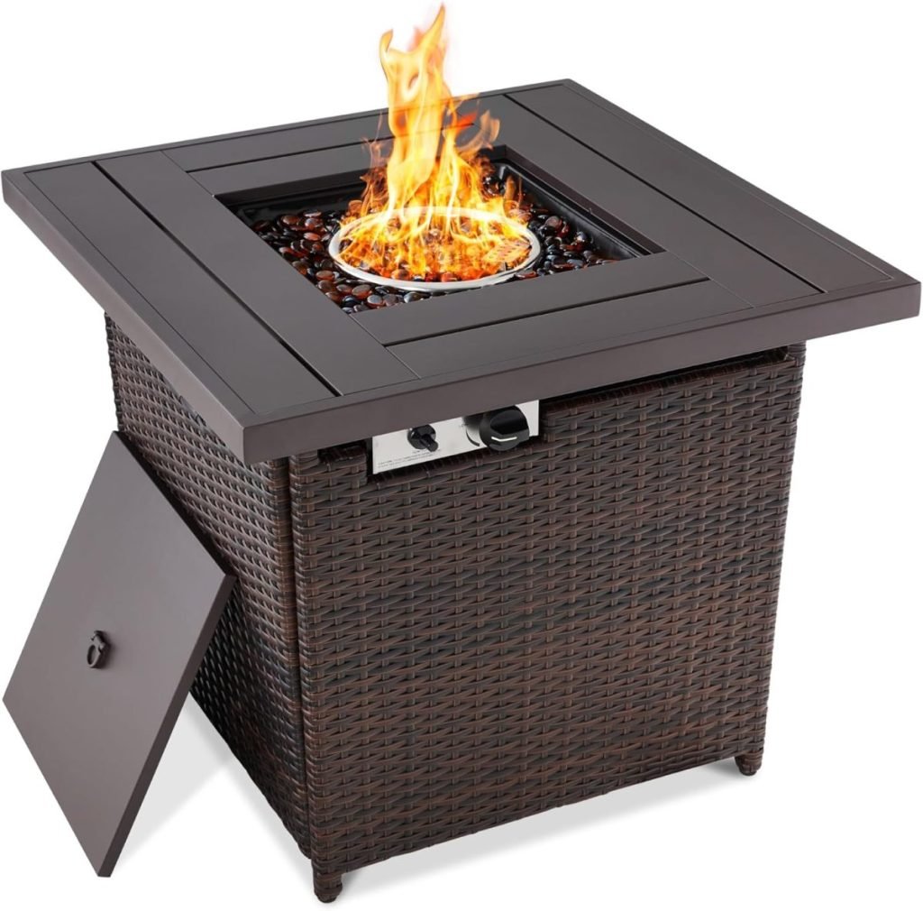 A square wicker propane fire pit table with flame and glass rocks, featuring a control panel and door at the front.