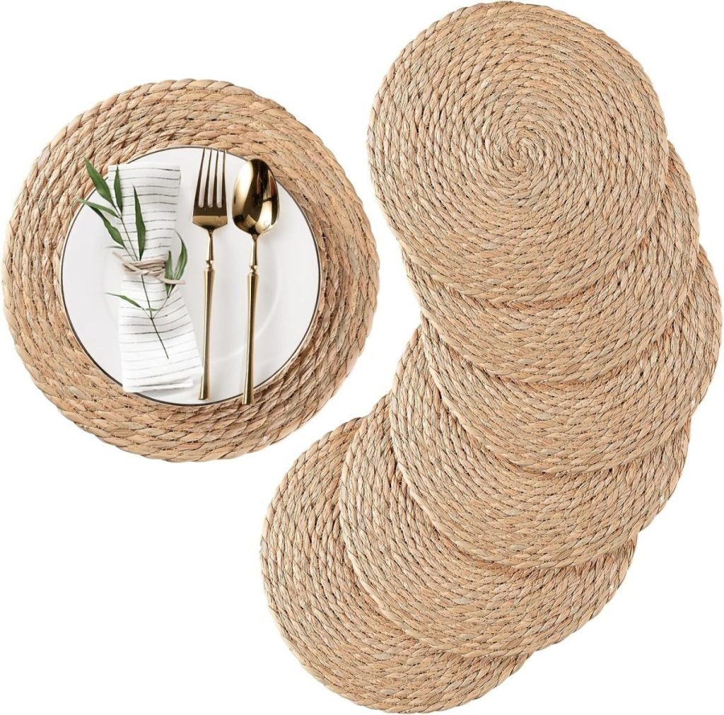 Set of seven round woven placemats, perfect for displaying your Thanksgiving plates, with one shown elegantly adorned with a plate, cutlery, napkin, and a charming plant sprig.