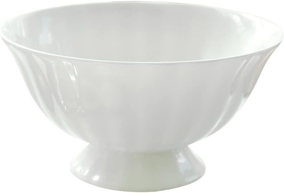 A white, empty ceramic bowl with a wide rim and a short pedestal base.