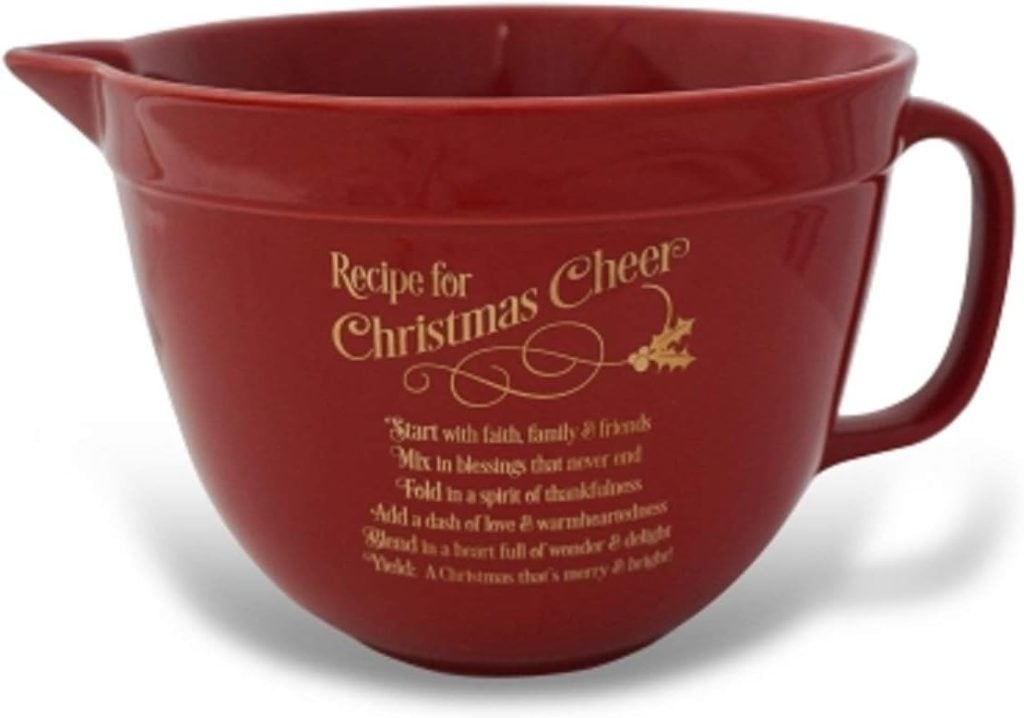 A red mixing bowl with a handle and spout, featuring a gold inscription titled "Recipe for Christmas Cheer" with a list of festive ingredients—perfect for creating your favorite holiday desserts.