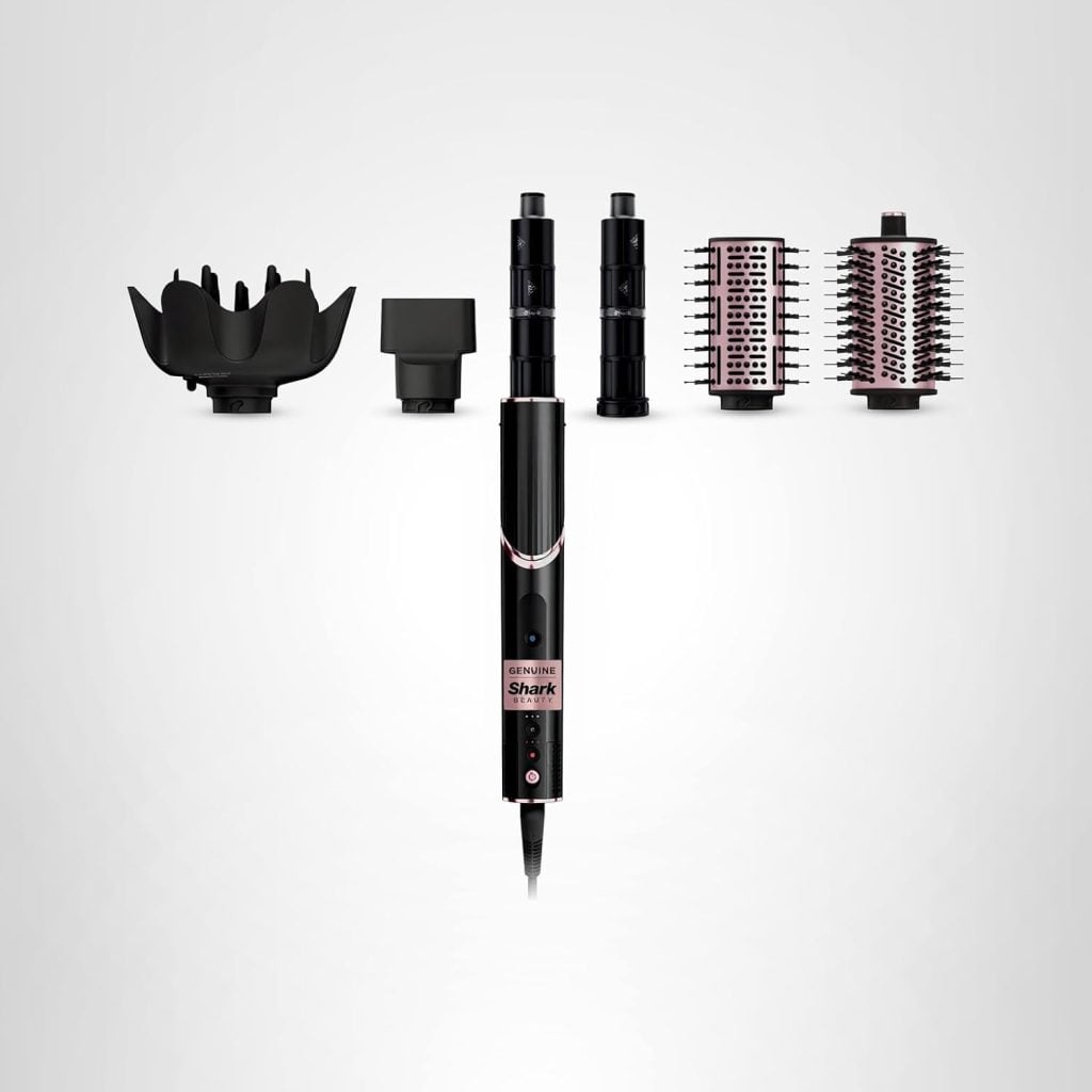 A black Shark FlexStyle hair styler with five interchangeable attachments arranged in a row on a plain white background—perfect for styling while baking classic Christmas cookies.