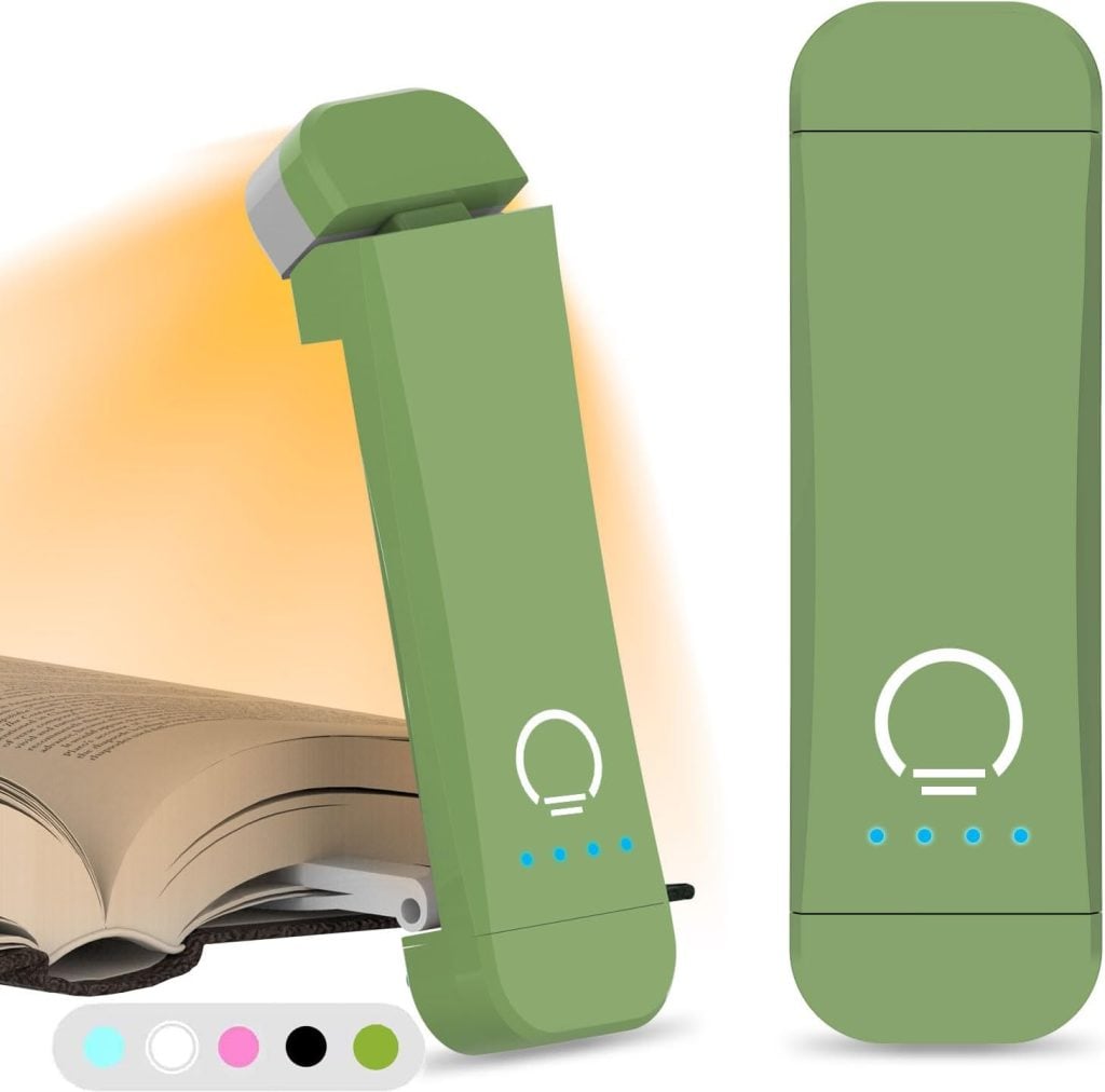 A green clip-on book light with LED indicators, perfect for cozy Christmas Morning reading, is shown both clipped to an open book and separately closed; color options are displayed below.
