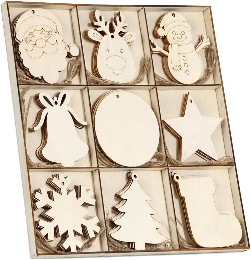 A set of unfinished wooden holiday ornaments, including a Santa, reindeer, snowman, and more, are neatly arranged in a grid like treasures from an oyster shell waiting to be discovered.