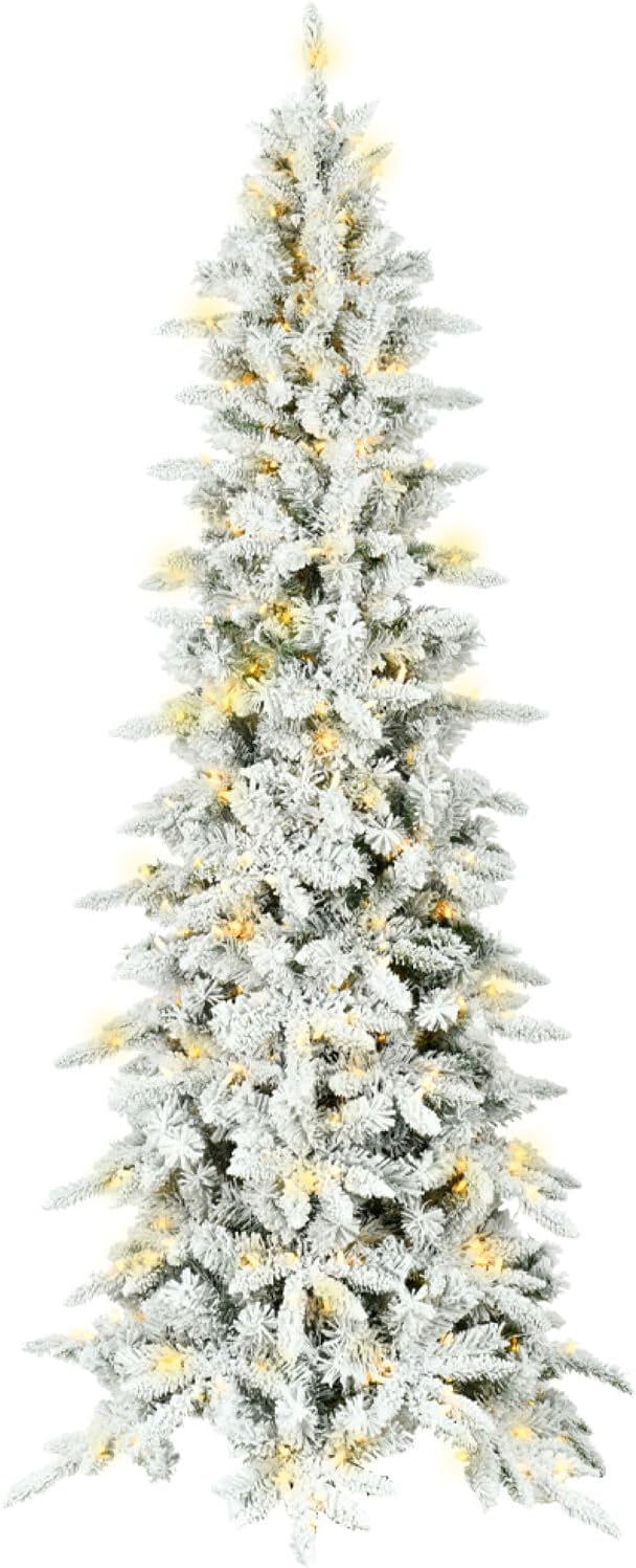 A tall, slim artificial Christmas tree with white flocked branches and warm white lights stands against a white background, evoking the elegance of classic Christmas colors.