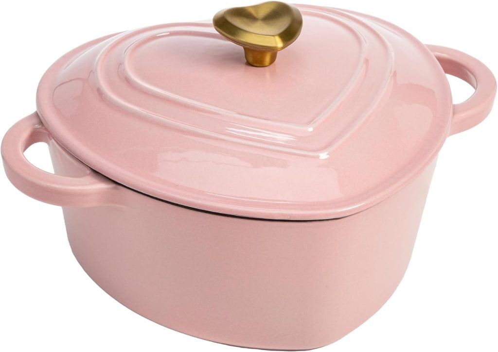 Heart-shaped pink pot with a lid and gold knob, perfect for adding elegance to your table. Ideal for Black Friday deals, it's a charming piece that combines style and functionality.