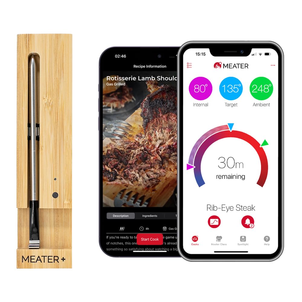 A wireless meat thermometer in a wooden charging dock sits beside two smartphones displaying a cooking app with temperature and timer info—perfect for mastering Christmas Morning feasts.