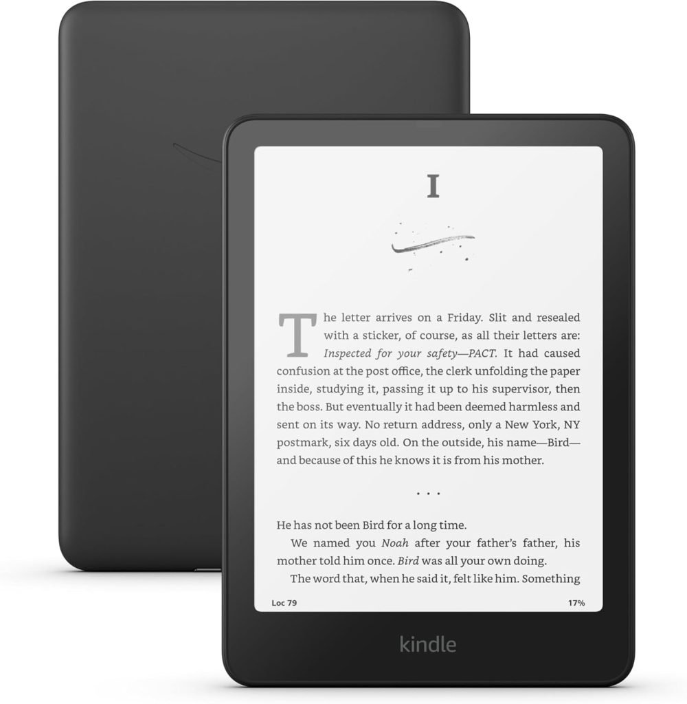 Two Kindle e-readers, one displaying text from a book. Both devices have black casings and are standing upright, ready for Black Friday deals.