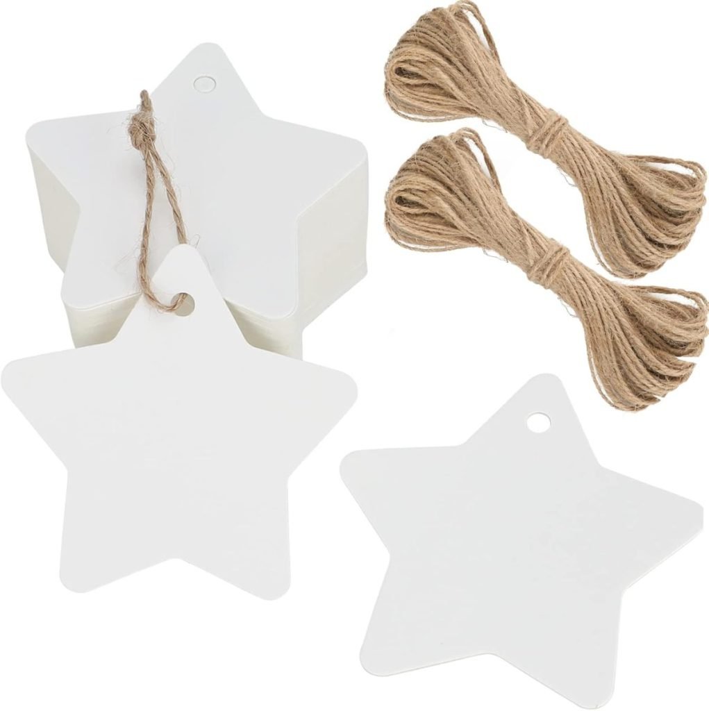 White star-shaped tags with holes, two bundles of brown twine, and an assembled tag with a twine loop perfect for learning how to tie a bow.