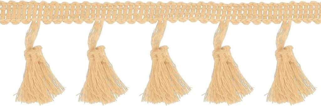 Beige woven trim with evenly spaced tassels hanging from a decorative band, perfect for learning how to tie a bow, displayed against a white background.