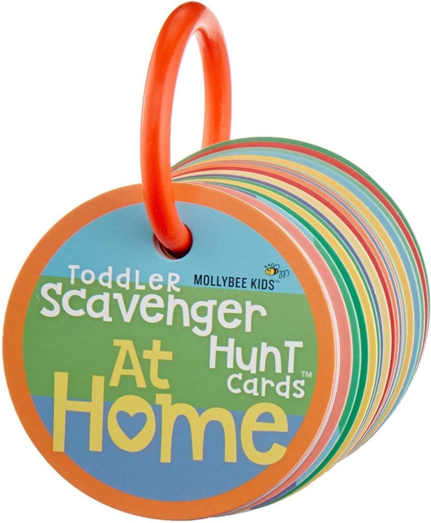 A set of circular, colorful "Toddler Scavenger Hunt Cards At Home" by Mollybee Kids, held together with an orange plastic ring—perfect for adding extra fun to Christmas Morning.