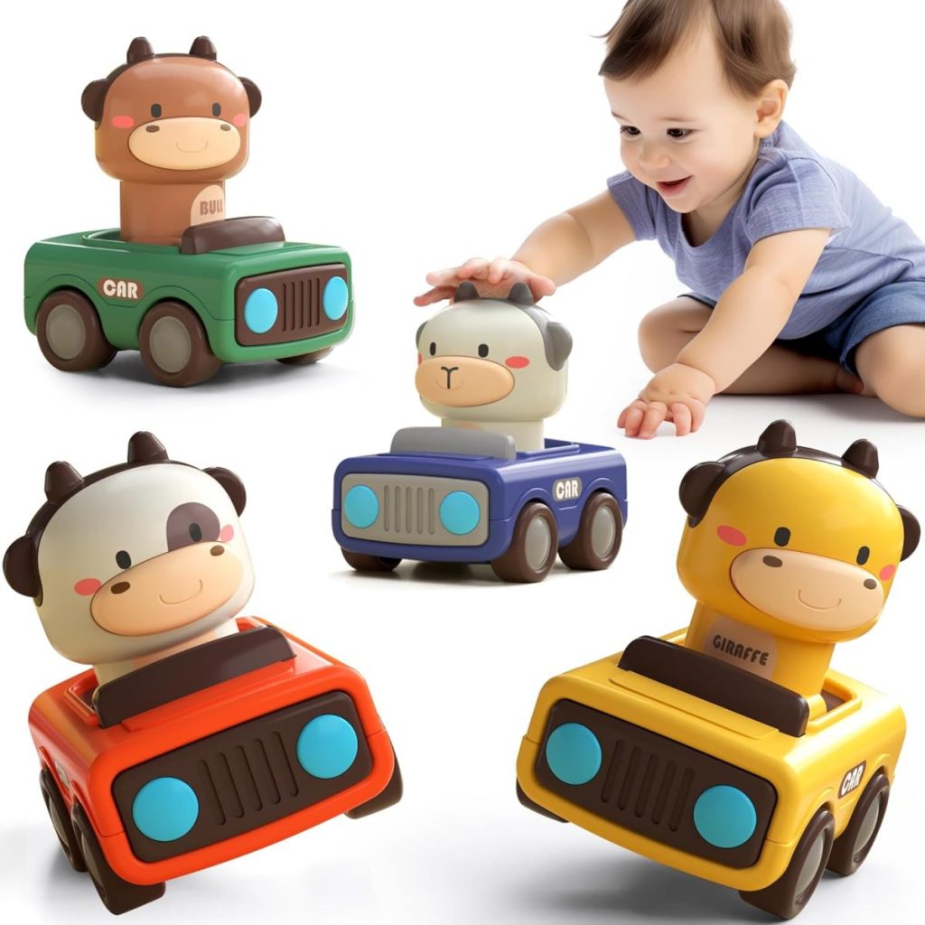 A baby plays with four colorful toy cars, each featuring an animal figure: a cow, a dog, and a giraffe. The baby presses down on the dog car—perfect for little hands and fun Black Friday gift shopping.