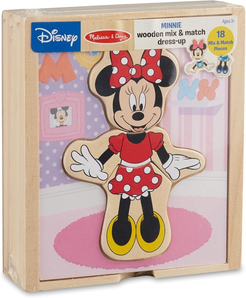 A wooden Disney Minnie Mouse mix and match dress-up toy set by Melissa & Doug, featuring 18 pieces, displayed in its packaging—a perfect surprise for Christmas Morning.