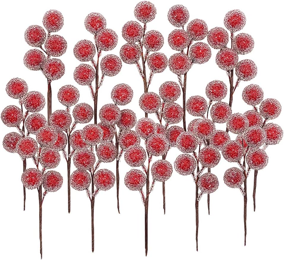 Red and white frosted artificial berries on brown stems are elegantly intertwined with a festive Christmas ribbon, creating a charming holiday arrangement.