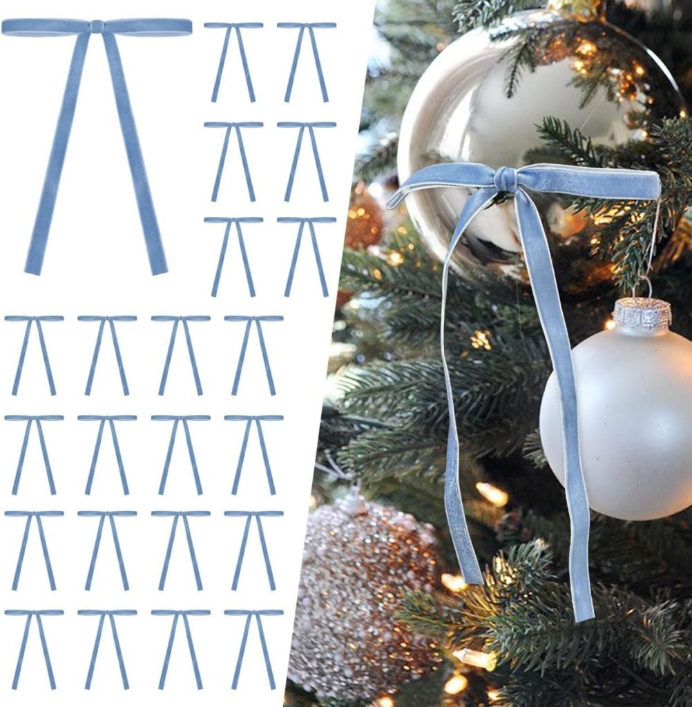 A Christmas tree decorated with a silver bauble and a blue velvet bow, with several similar bows shown on the left side against a plain white background.