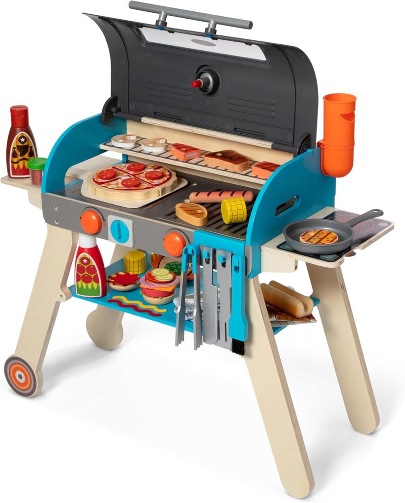 A toy grill set with play food items like burgers, hot dogs, corn, and cooking utensils displayed on and around the grill—perfect for Black Friday gift shopping.