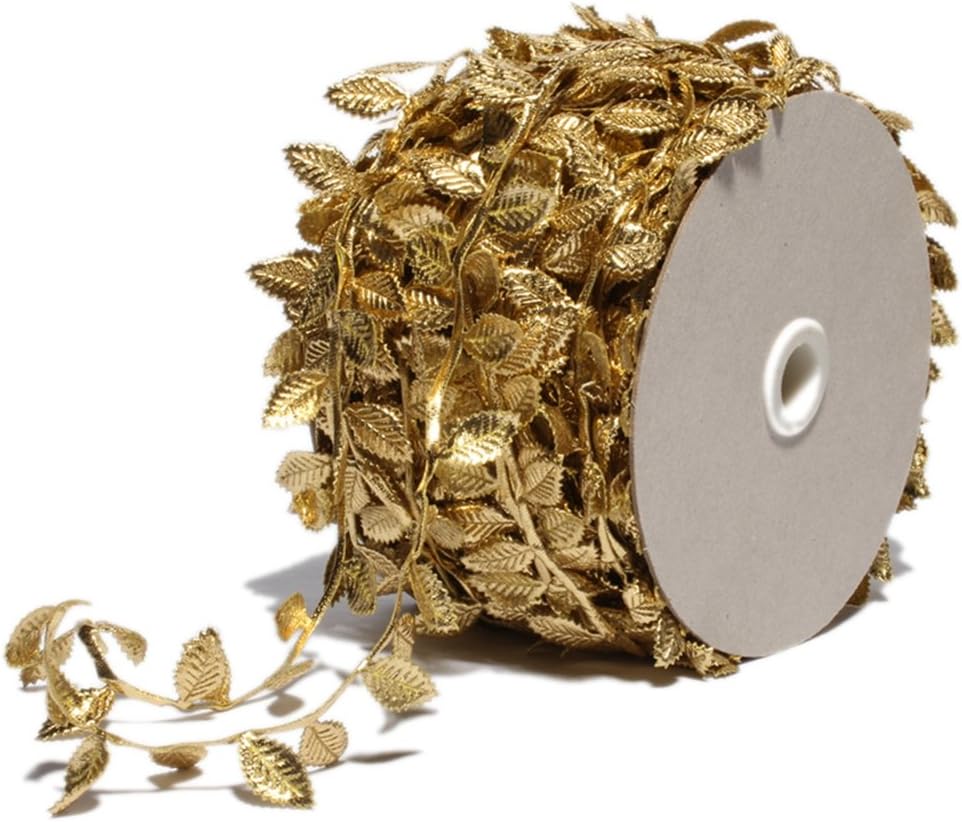 A spool of decorative gold leaf ribbon, with detailed leaf patterns, is partially unfurled, perfect for those learning how to tie a bow.