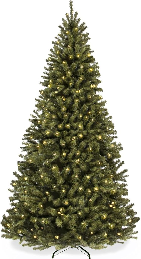 Artificial green Christmas tree with built-in warm white lights, standing on a metal stand against a plain white background—perfect for Black Friday holiday deals.