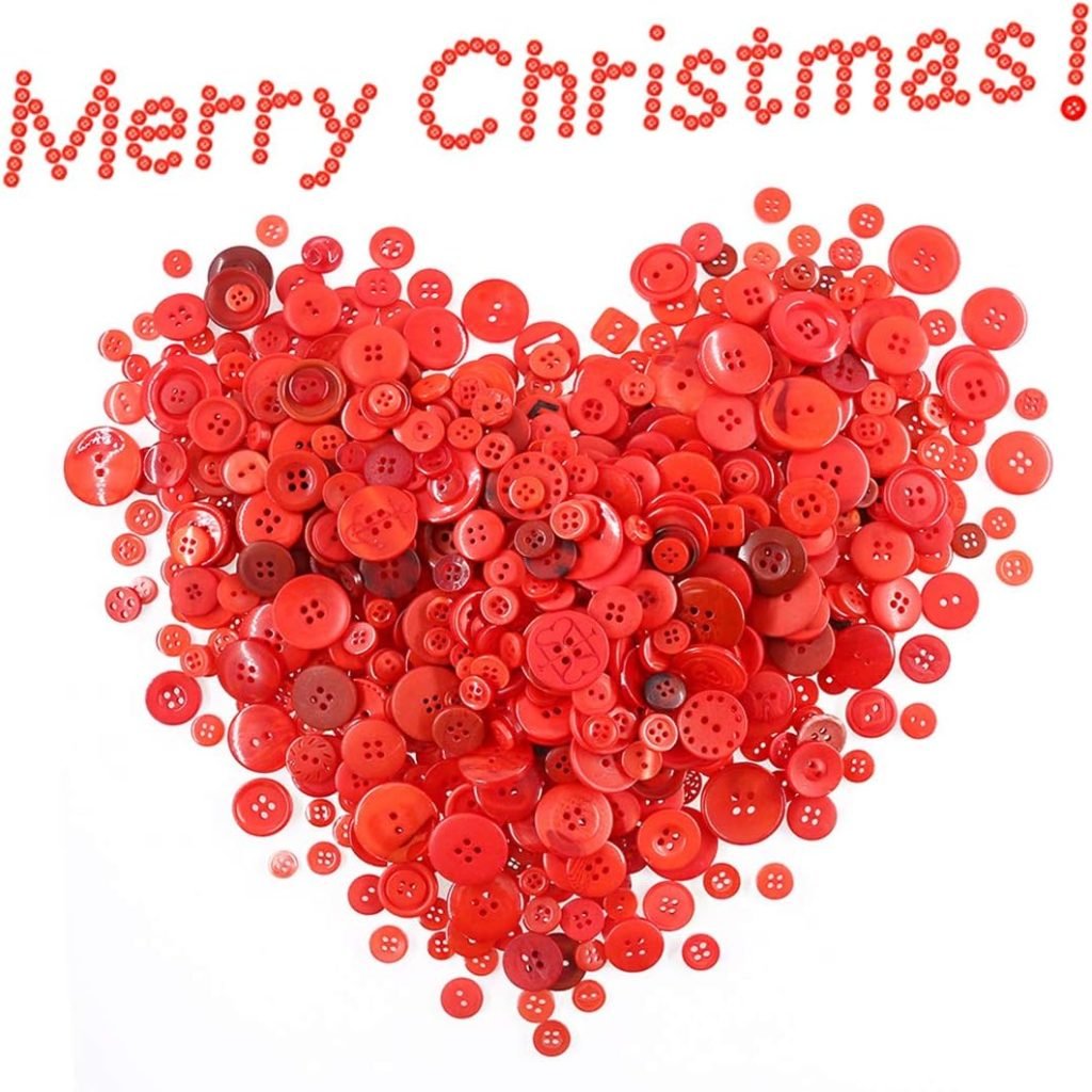 The heart shape, crafted from red buttons, beautifully captures the essence of button crafts. Above it, "Merry Christmas!" is elegantly spelled out in matching red buttons against a pristine white background.