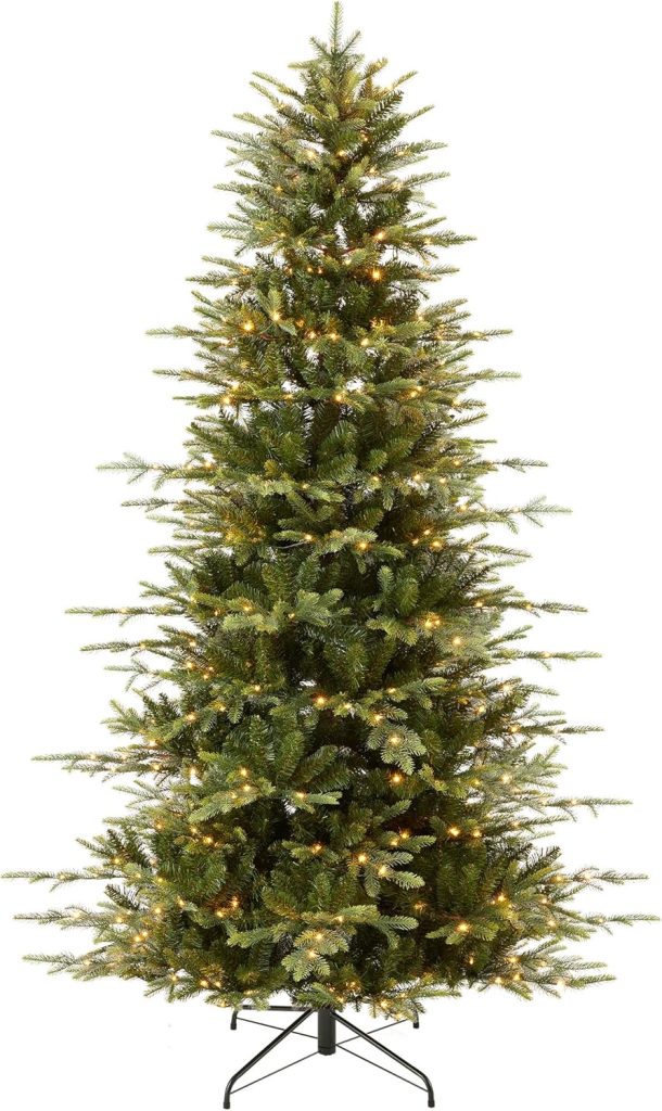 Artificial Christmas tree with built-in warm white lights, standing on a metal stand, featuring lush green branches—ready to brighten your space, whether you’re wrapping presents or sipping a festive vodka cranberry. No additional decorations included.