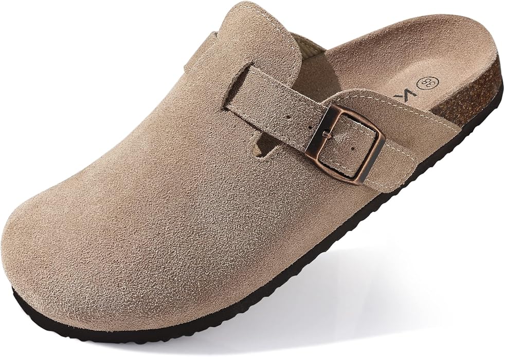Beige suede slip-on clog with a buckle strap and cork footbed, shown at an angle on a white background—perfect for Black Friday style upgrades.