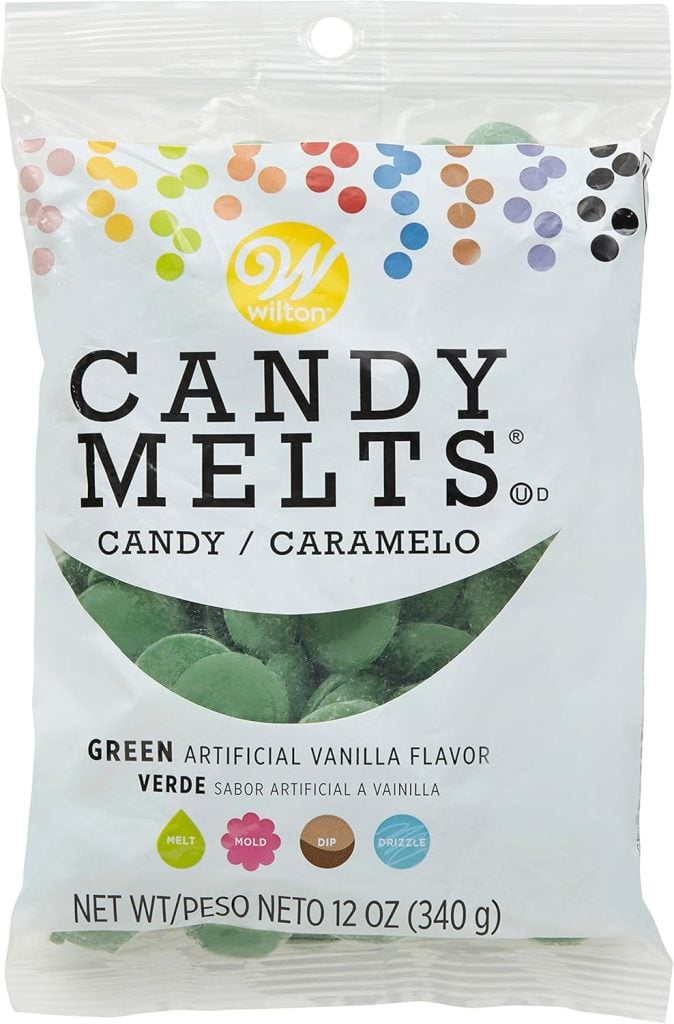 Bag of Wilton green candy melts with dots on top, perfect for decorating Christmas tree cupcakes, labeled as artificial vanilla flavor. Net weight 12 oz (340 g).