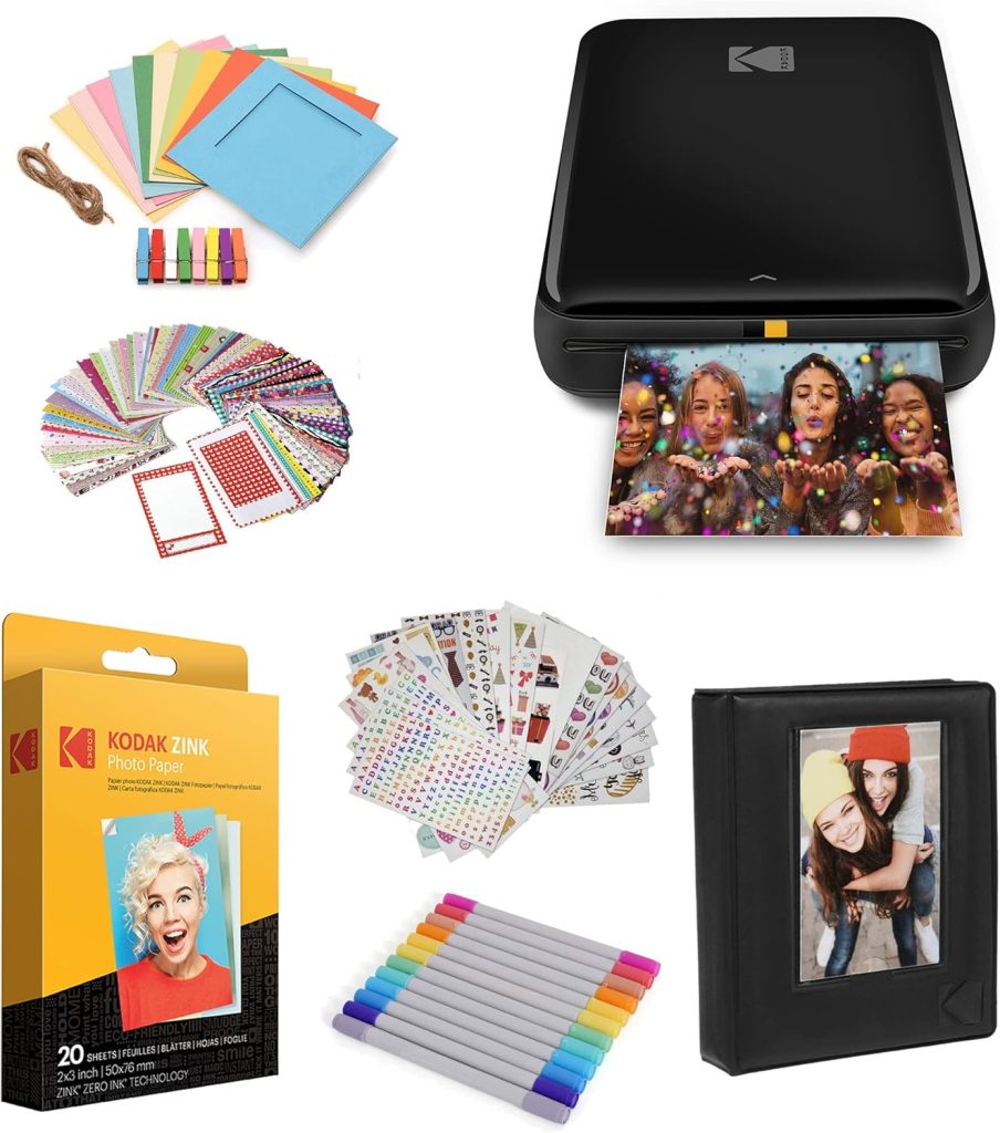 A Kodak photo printer kit with photo paper, colored markers, blank cards, sticker sheets, a photo album, and various decorative accessories—perfect for capturing memories and crafting gifts this Black Friday.