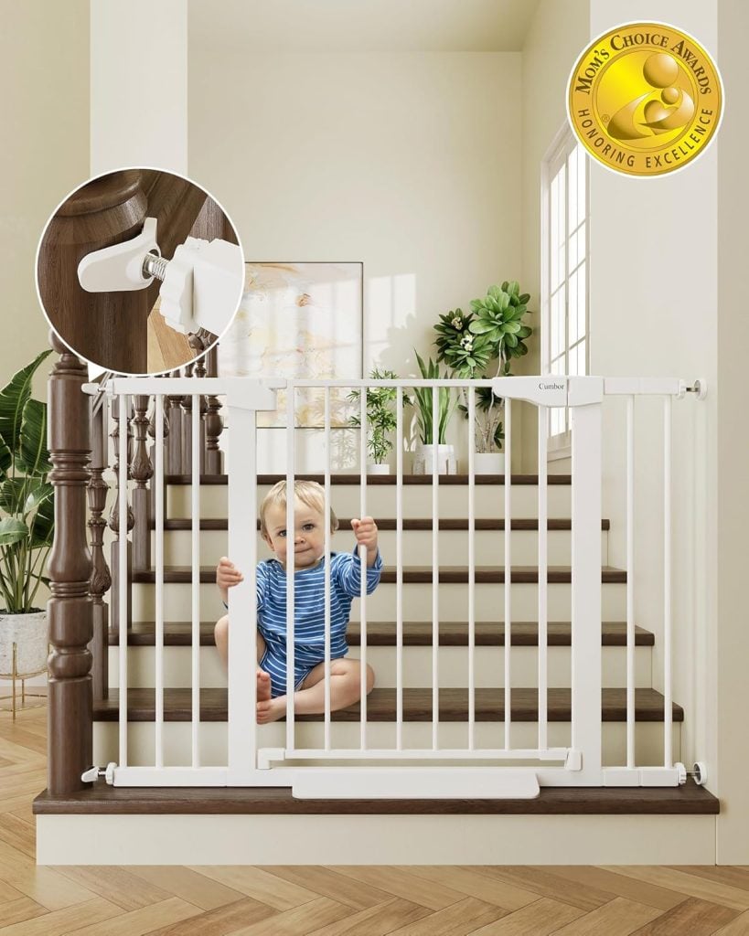 A toddler sits behind a white safety gate at the bottom of a staircase, surrounded by festive nutcracker decorations. An inset shows the gate's locking mechanism, ensuring safety during the holiday hustle. A "Mom's Choice Award" badge shines brightly in the corner, adding to the Christmas cheer.