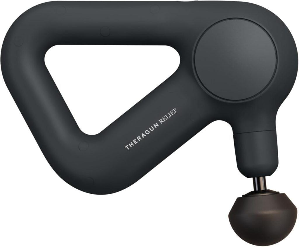 A black Theragun massager with a triangular handle and a round massage head.