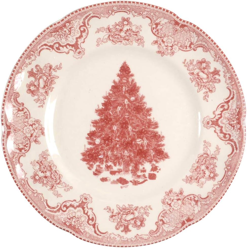 A decorative porcelain plate with a red Christmas tree design in the center, surrounded by an ornate floral border.