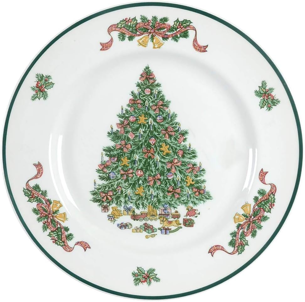 A decorative plate featuring a Christmas tree with ornaments at the center, surrounded by ribbon and bell designs, on a white background with a dark green rim.