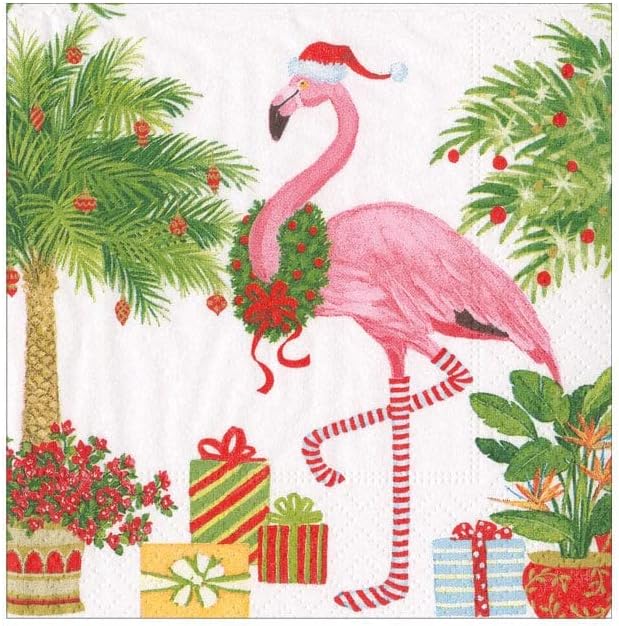 A flamingo wearing a Santa hat and wreath stands among palm trees and festive presents.