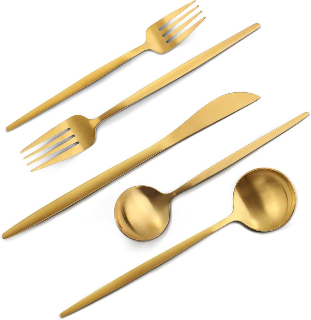 A set of five gold-colored utensils, including two forks, a knife, a soup spoon, and a tablespoon, arranged diagonally on a white background—perfect for elevating your table during the season of giving.