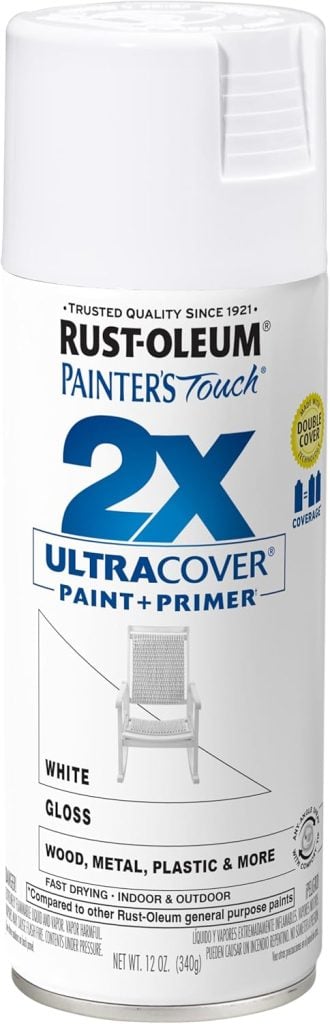 A can of Rust-Oleum Painter's Touch 2x Ultra Cover paint and primer in festive white gloss, perfect for bringing Christmas joy to wood, metal, plastic, and more with its 12 oz capacity.