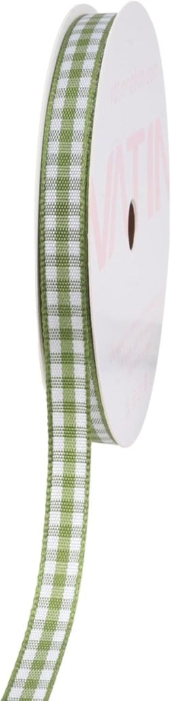 A roll of green and white plaid ribbon on a white spool, perfect for adding a touch of Christmas joy to your festive decorations.