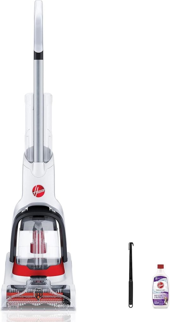 Front view of a Hoover carpet cleaner with a cleaning brush and a bottle of cleaning solution positioned to its right on a white background—perfect for refreshing carpets before trying new table setting ideas.