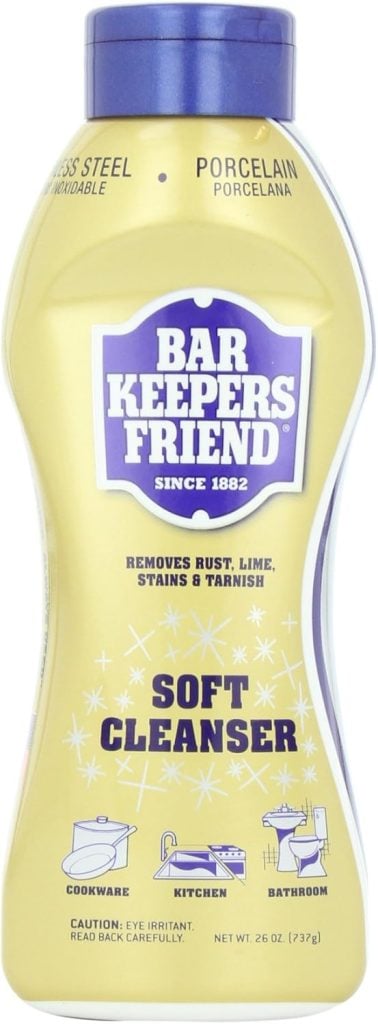 A bottle of Bar Keepers Friend Soft Cleanser, labeled for use on cookware, kitchen, and bathroom, claims to remove rust, lime, stains, and tarnish—perfect for keeping your table setting ideas sparkling clean.