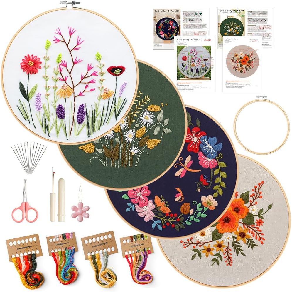 Embroidery kit with four floral designs in hoops, colorful threads, scissors, needles, needle threaders, and instructional sheets—perfect for creative gifts in the season of giving.