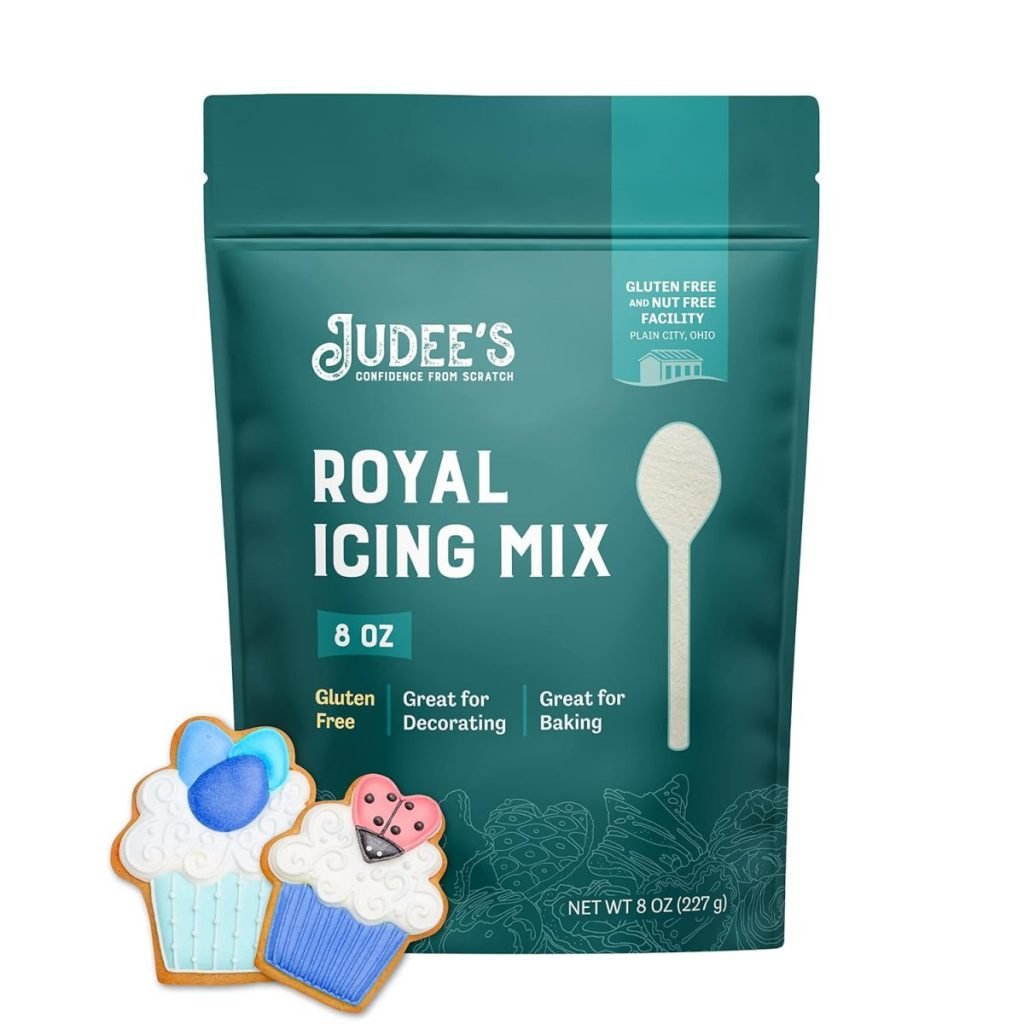 A bag of Judee's Royal Icing Mix is displayed with decorated cookie illustrations. The packaging highlights it as gluten-free and suitable for decorating and baking. Net weight: 8 oz (227 g).