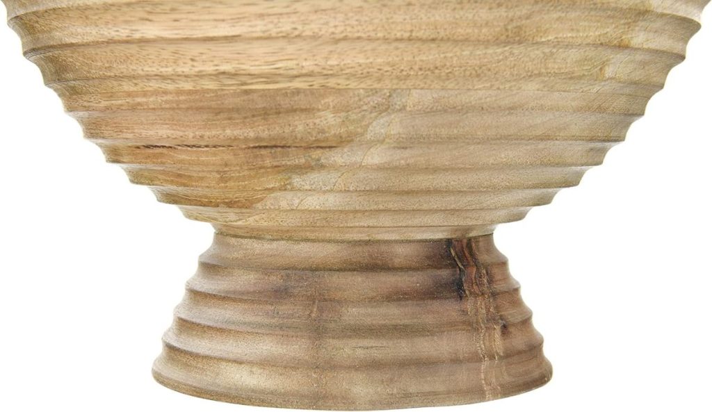 A close-up of a wooden bowl with a ridged, layered texture and a wide base, shown against a plain background—perfect for sharing treats during the season of giving.