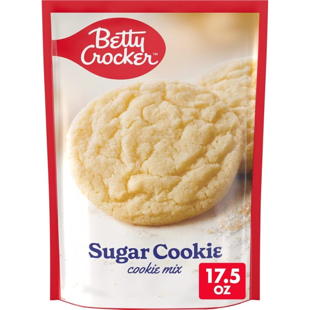 Betty Crocker Sugar Cookie Mix package, featuring a large image of a sugar cookie. Package weight is 17.5 oz.