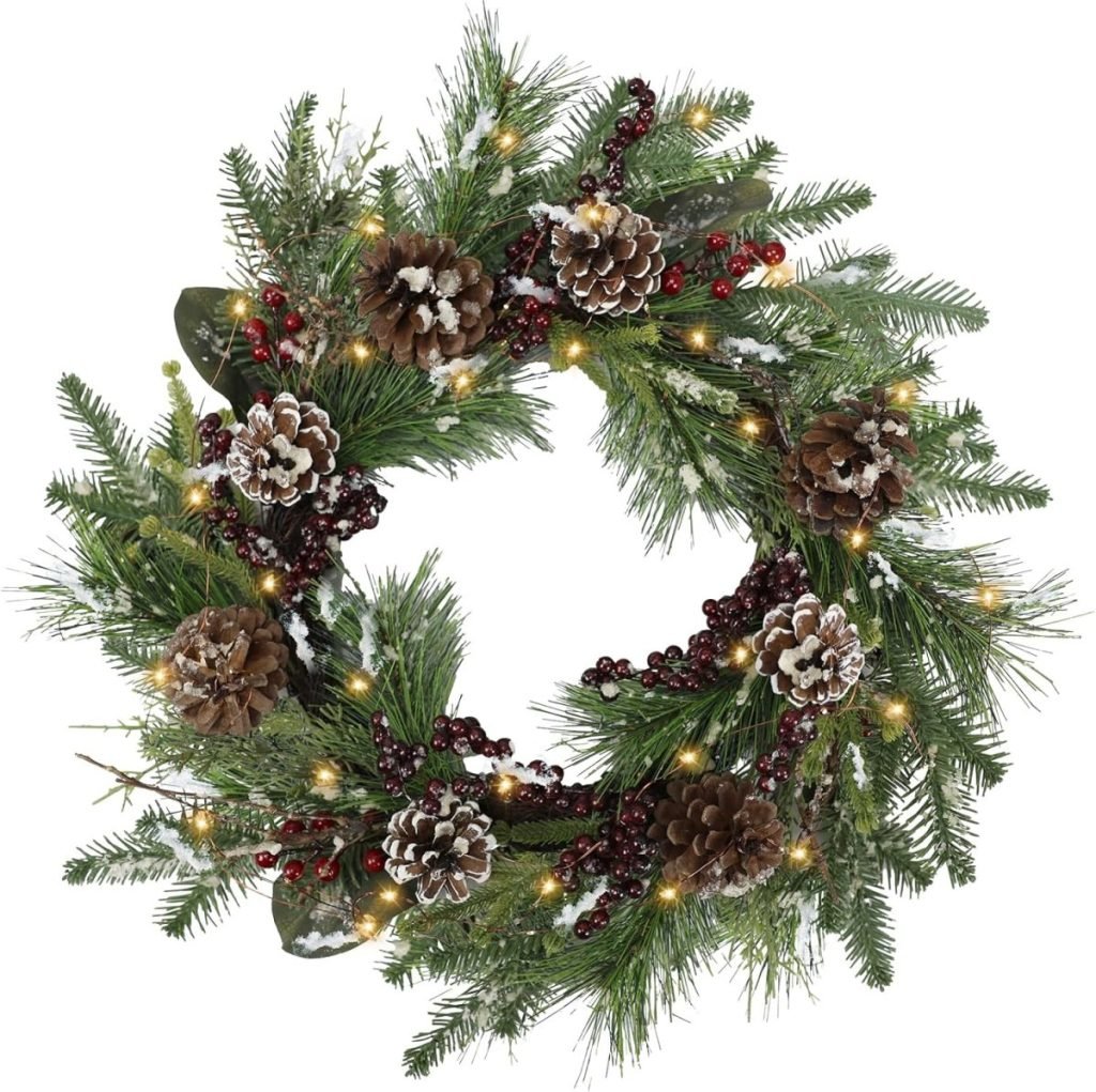 Christmas wreath with pinecones, berries, and green foliage, adorned with small lights surrounding a circular frame.