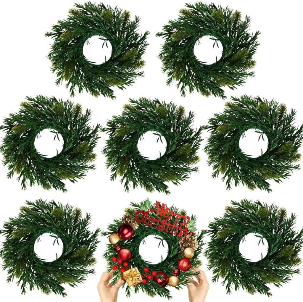 Seven green wreaths arranged in a grid; the bottom center wreath is decorated with red ornaments and a "Merry Christmas" sign.