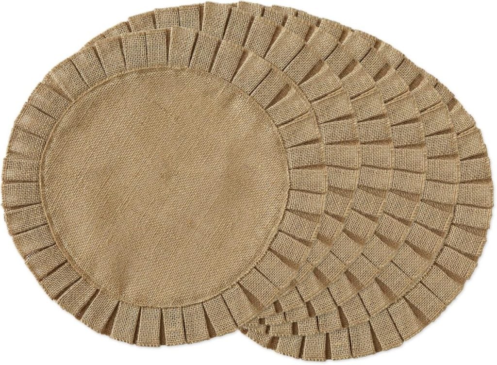 Four round burlap placemats with fringed edges arranged in overlapping layers.