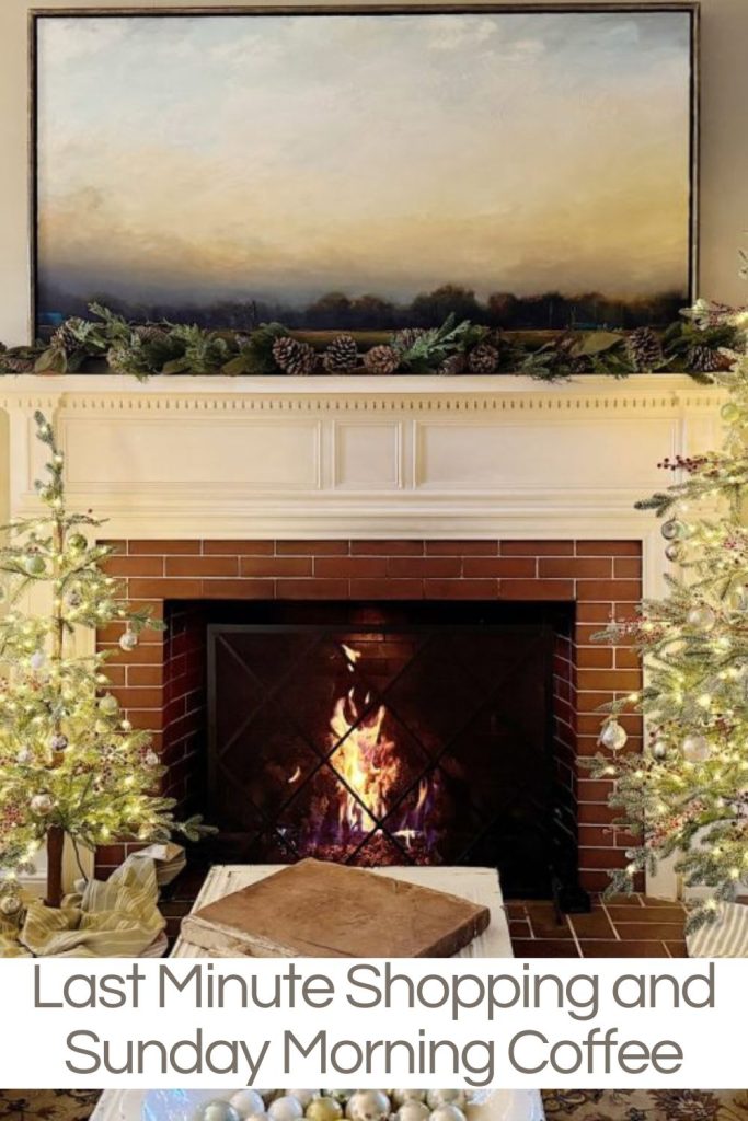 A cozy fireplace with a decorative mantel, surrounded by two small lit Christmas trees. A painting and greenery adorn the mantel. Text reads, "Last Minute Shopping and Sunday Morning Coffee.